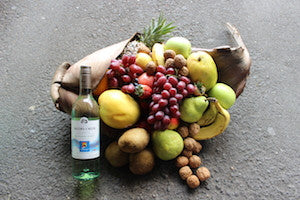 Fruit husk hamper with nuts and Sauvignon Blanc