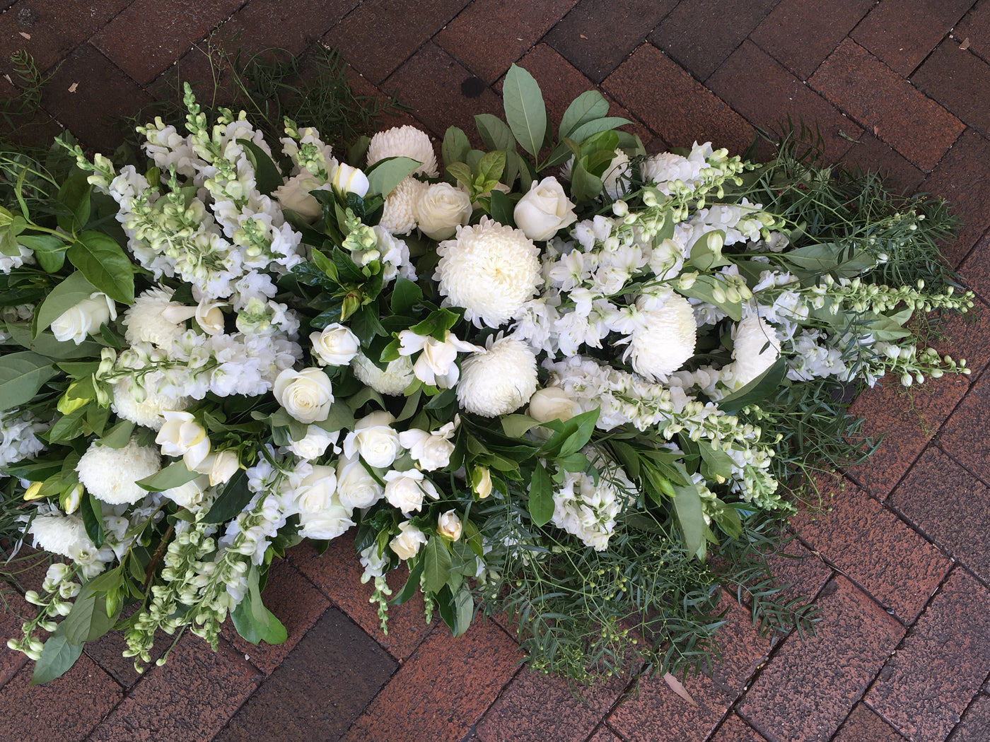 Textured white and grey casket cover
