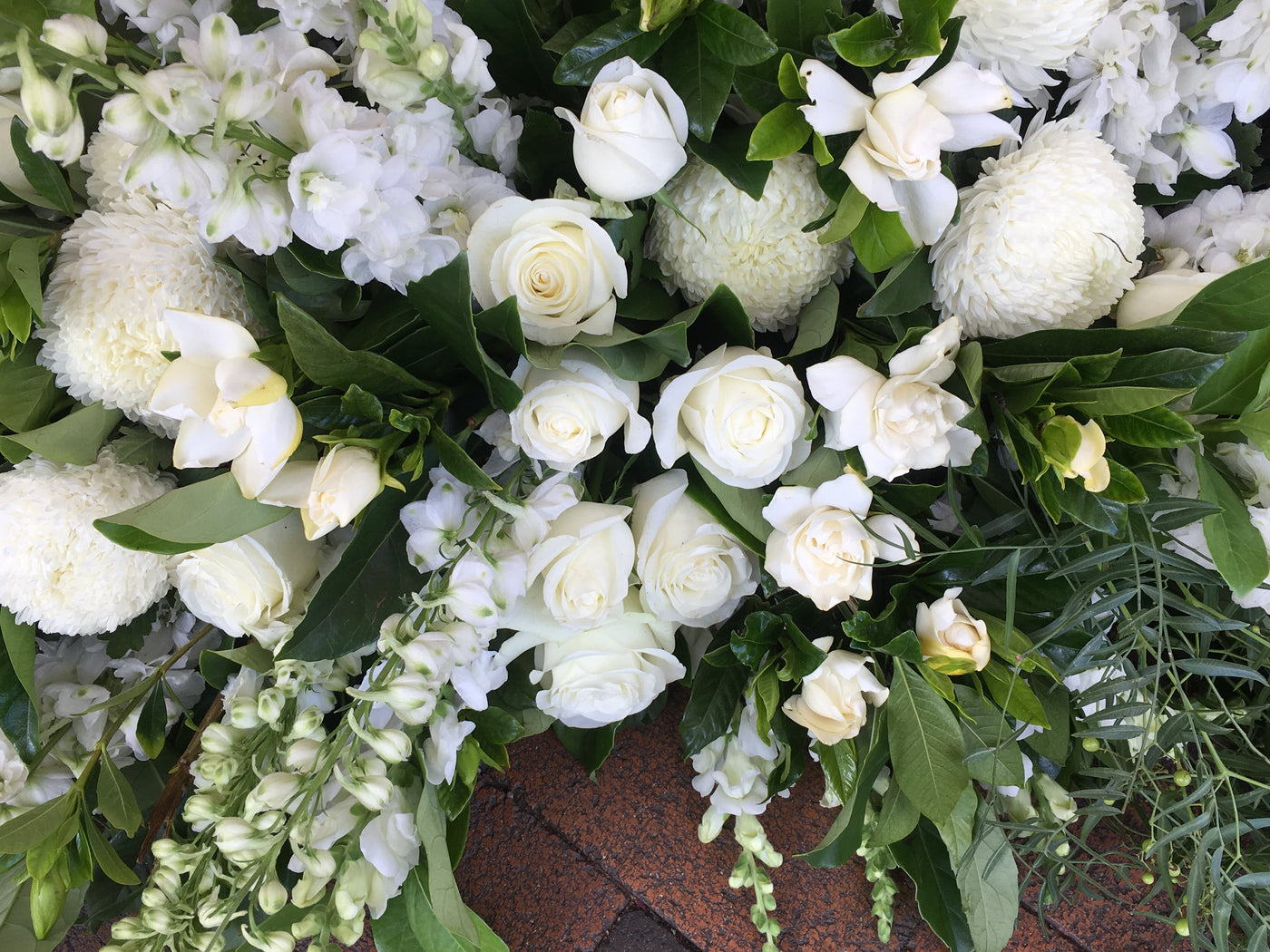 Textured white and grey casket cover