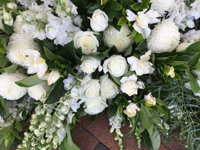 Textured white and grey casket cover