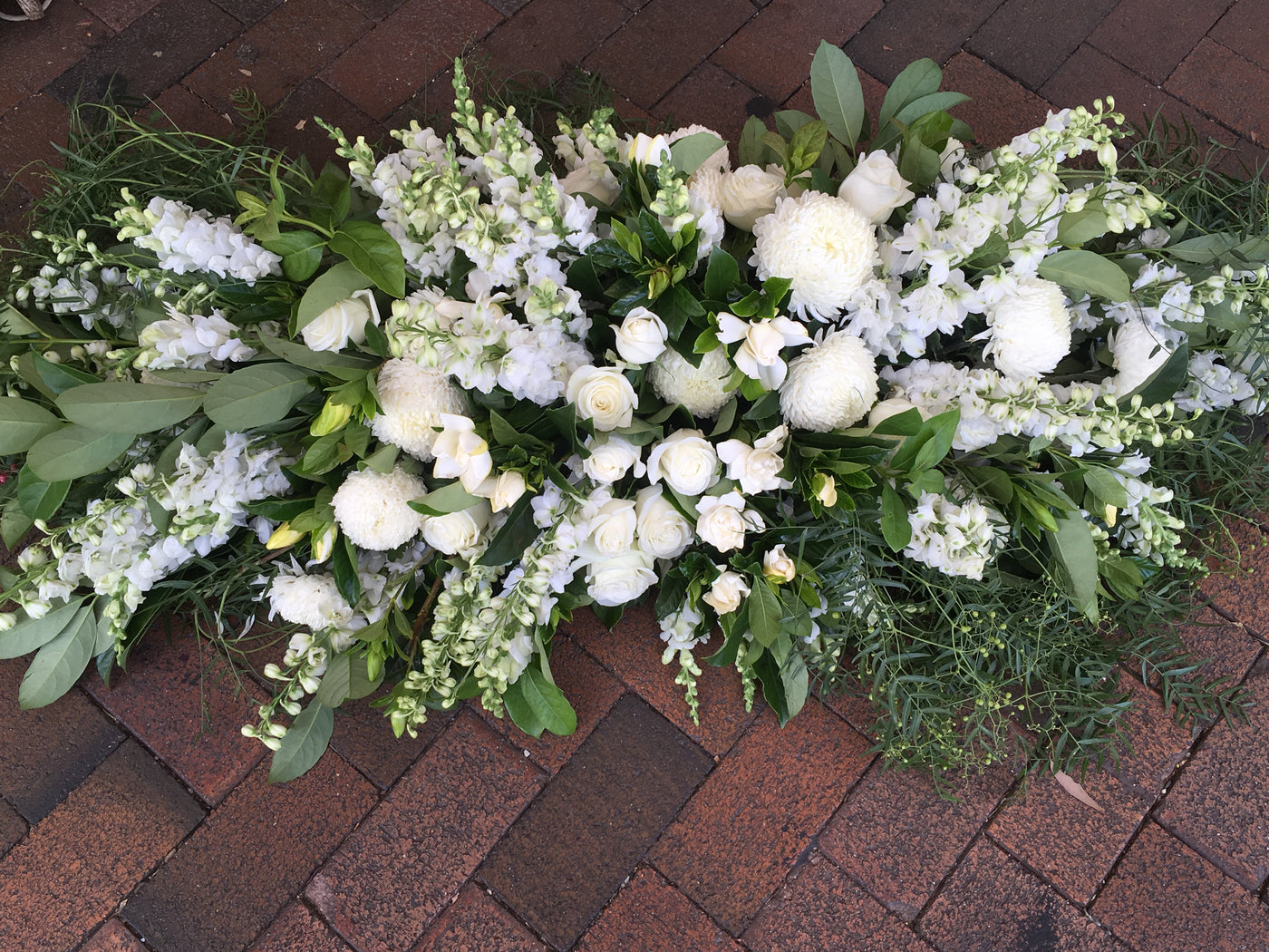 Textured white and grey casket cover