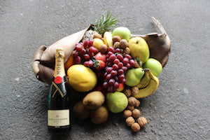 Fruit husk hamper with nuts and Moet