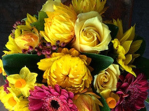 Bright flowers in a mini box
