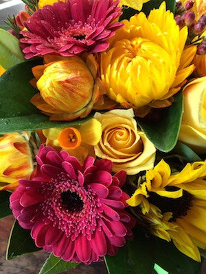 Bright flowers in a mini box