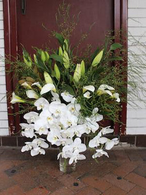 Large and impressive all white flower arrangement