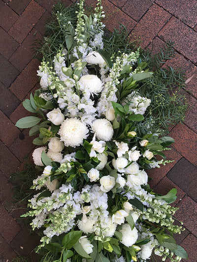 Textured white and grey casket cover